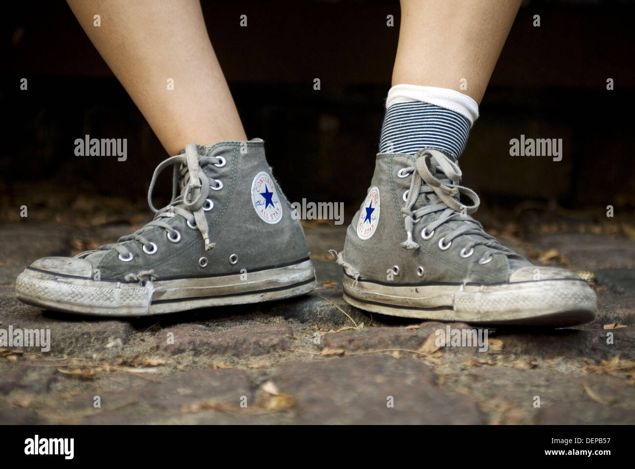 Worn out converse hi-res stock photography and images - Alamy