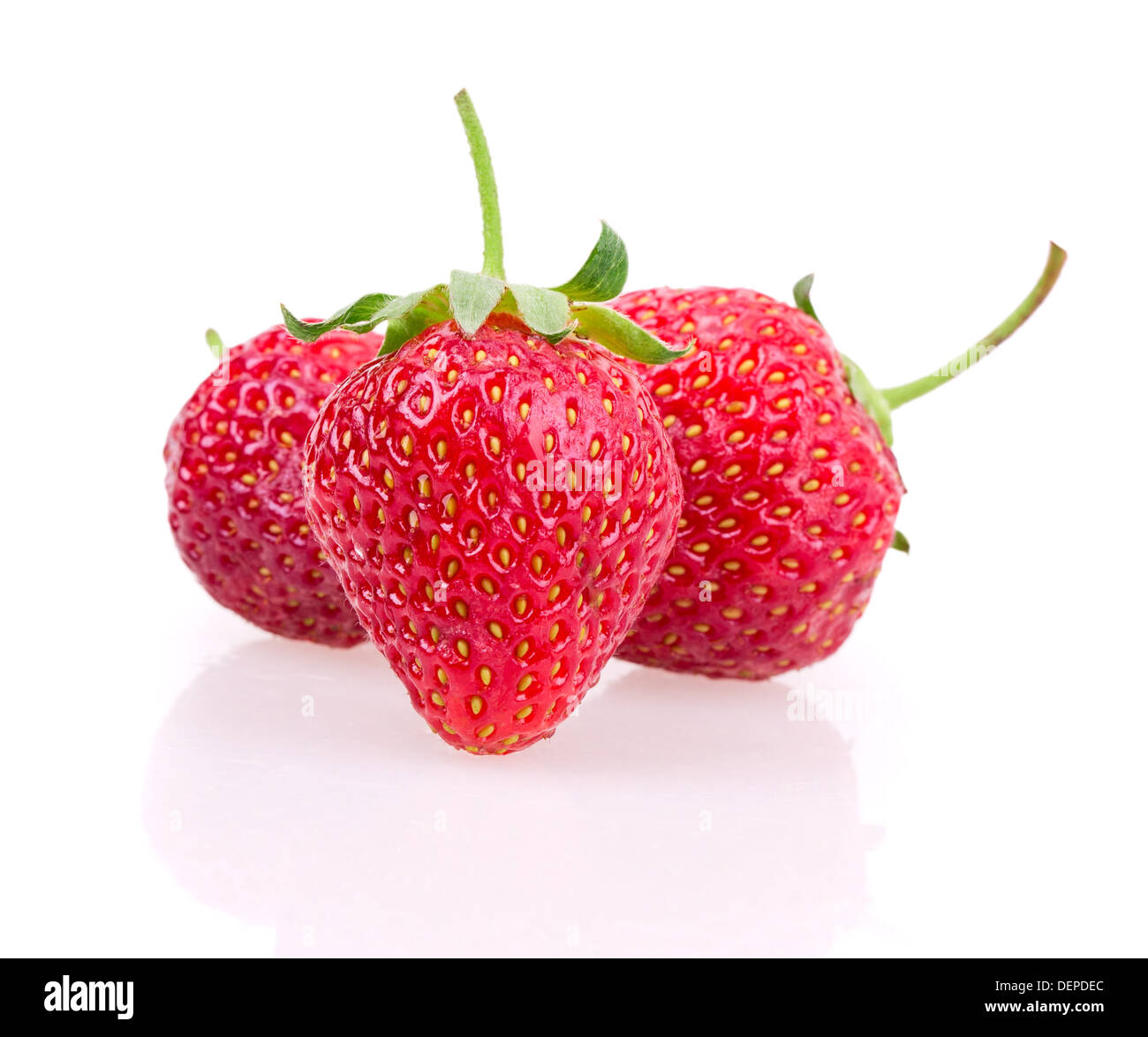 juicy ripe strawberries with leaves on a white background Stock Photo ...