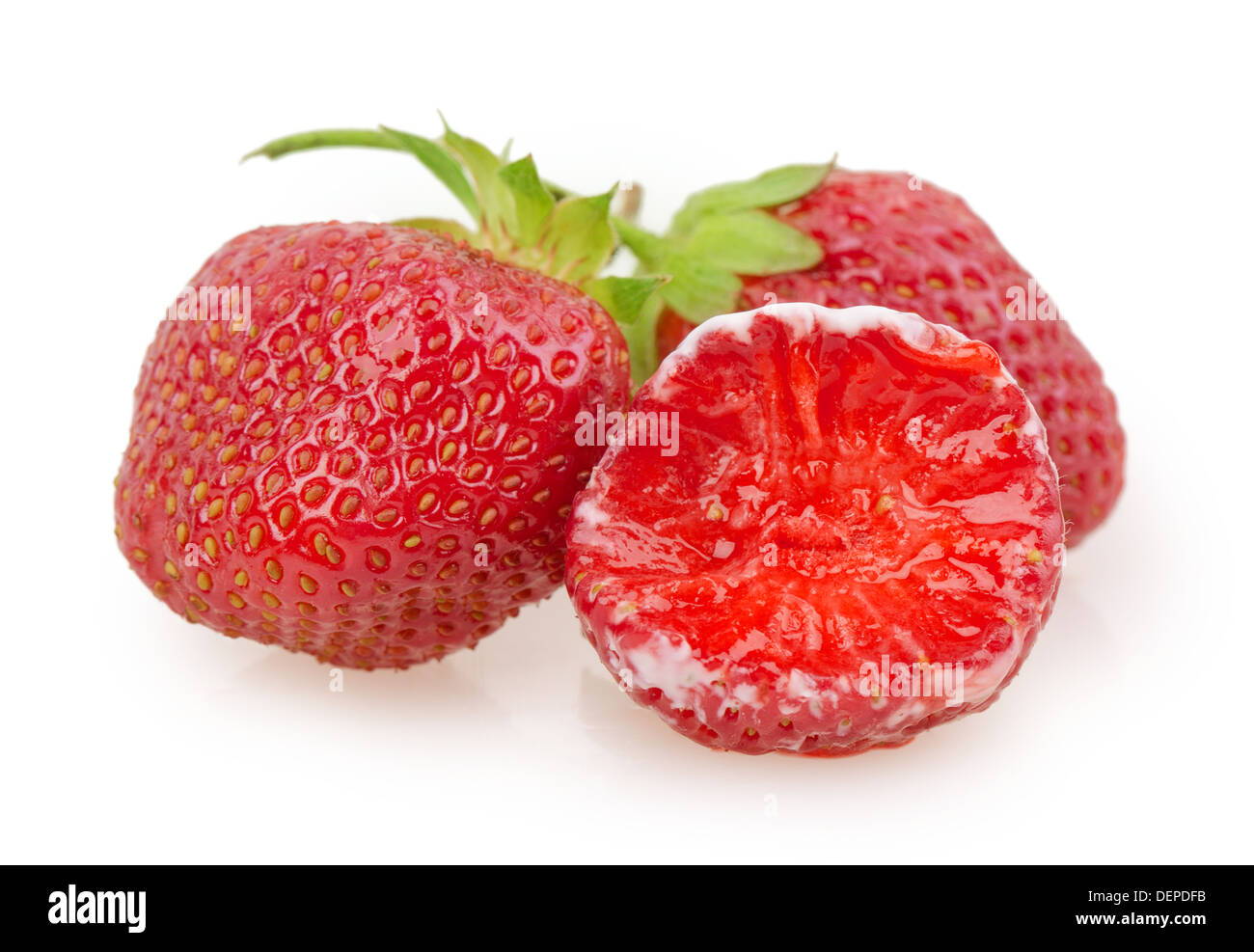 juicy ripe strawberries with leaves on a white background Stock Photo ...