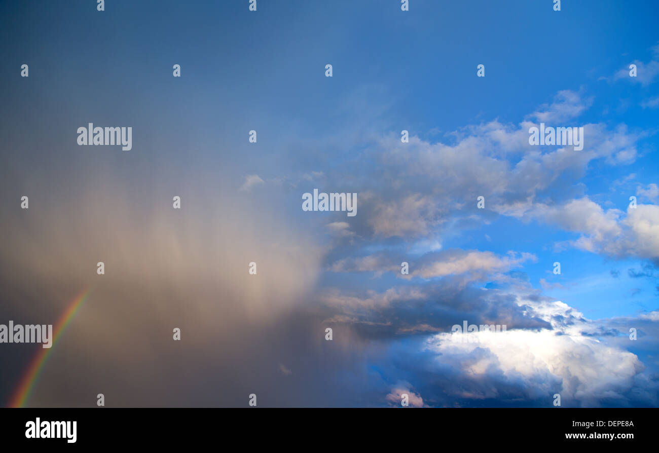 Rainbow on a dark sky hi-res stock photography and images - Alamy