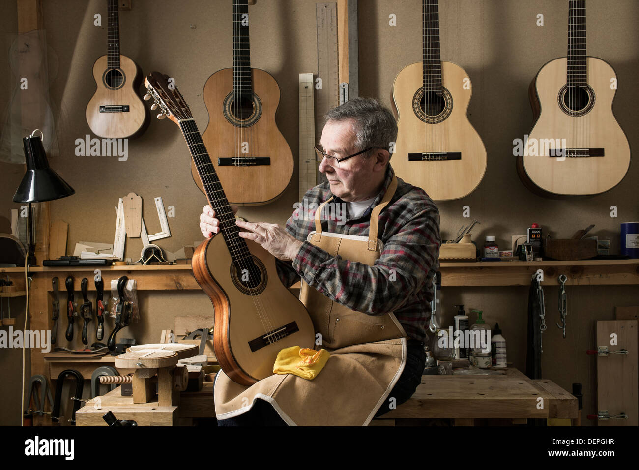 Stringed Instrument Maker Stock Photos & Stringed Instrument Maker