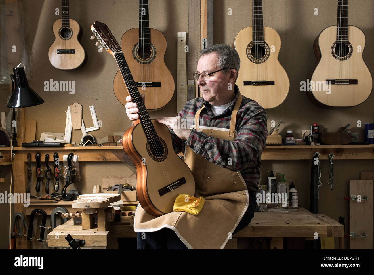 Stringed Instrument Maker Stock Photos & Stringed Instrument Maker