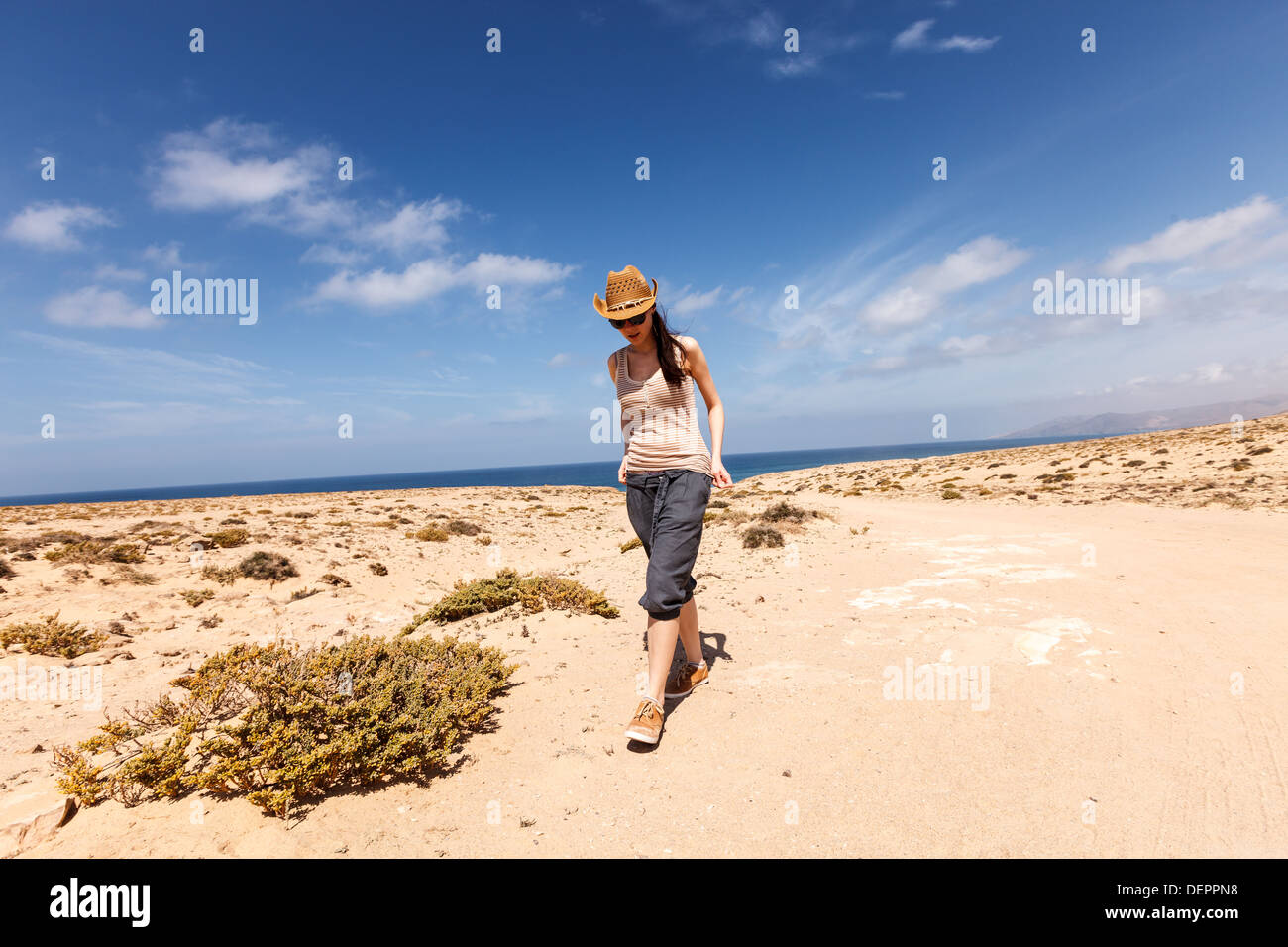 A young woman travels to the island of Fuerteventura Stock Photo