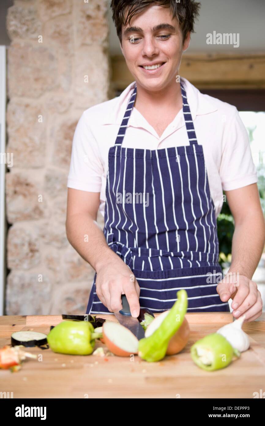 Cooking young man Stock Photo - Alamy