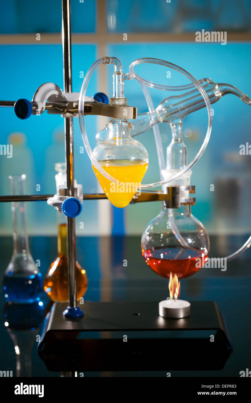 flame and the flask in a chemical laboratory Stock Photo