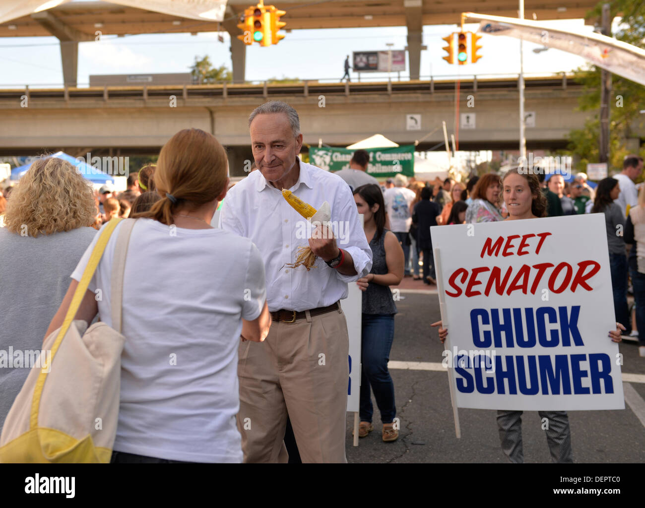 Bellmore, New York, U.S. 22nd September 2013. U.S. Senator CHARLES 'CHUCK' SCHUMER  (Democrat), running for re-election in November, makes a campaign visit at the 27th Annual Bellmore Festival, featuring family fun with exhibits and attractions in a 25 square block area, with over 120,000 people expected to attend over the weekend. Credit:  Ann E Parry/Alamy Live News Stock Photo