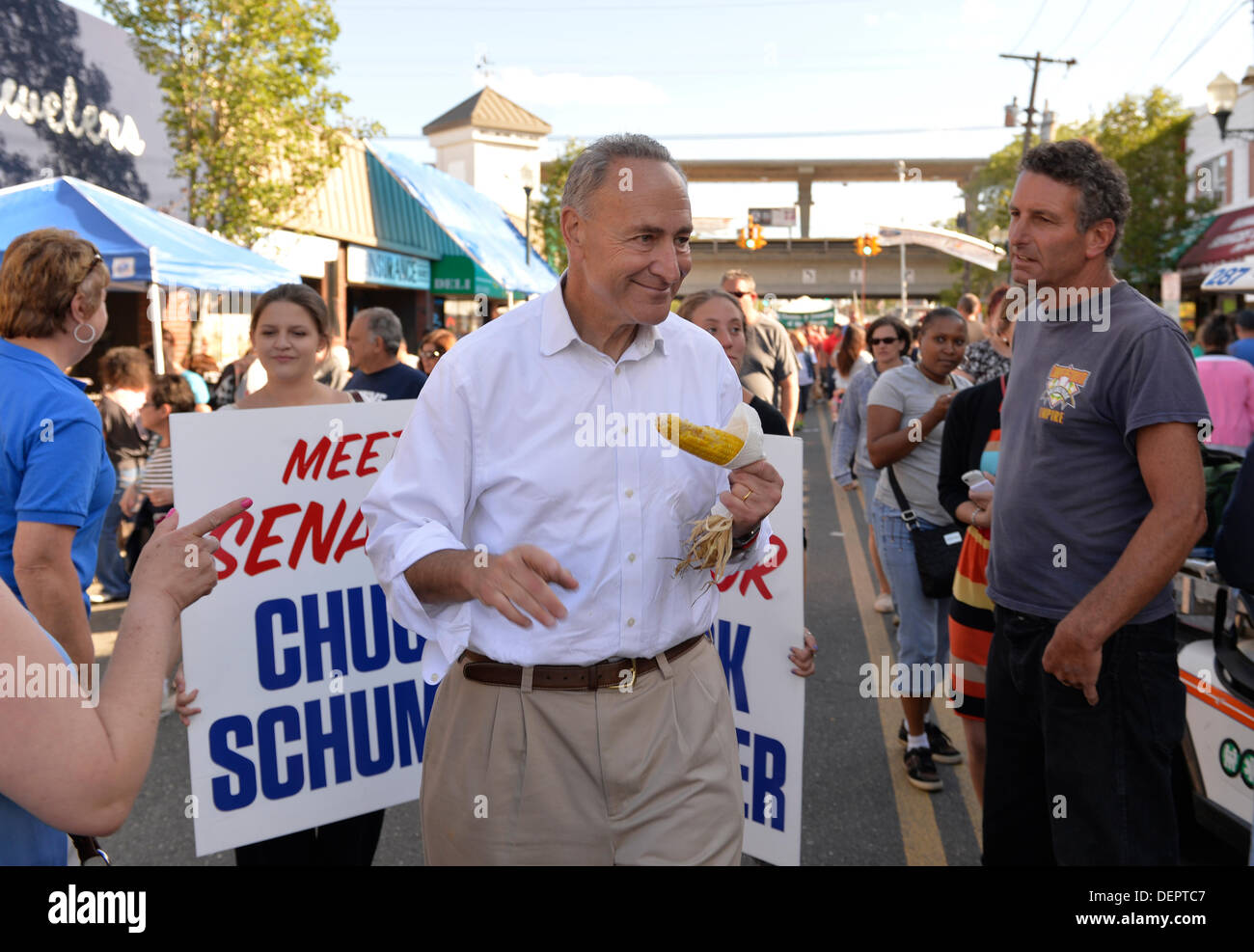 Bellmore, New York, U.S. 22nd September 2013. U.S. Senator CHARLES 'CHUCK' SCHUMER  (Democrat), running for re-election in November, makes a campaign visit at the 27th Annual Bellmore Festival, featuring family fun with exhibits and attractions in a 25 square block area, with over 120,000 people expected to attend over the weekend. Credit:  Ann E Parry/Alamy Live News Stock Photo