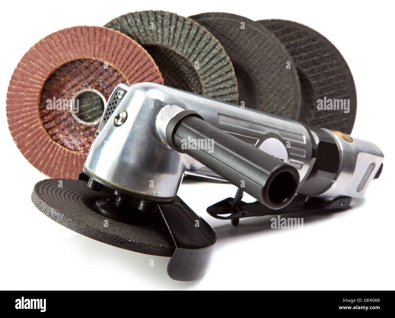 air angle grinder and different grinding wheels on white background