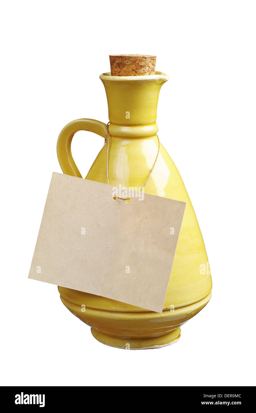 Ceramic jug and blank label isolated on white Stock Photo