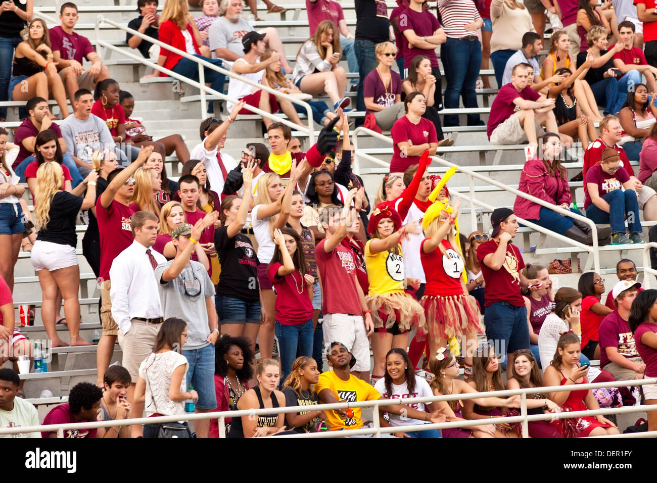 College students at a football game Stock Photo
