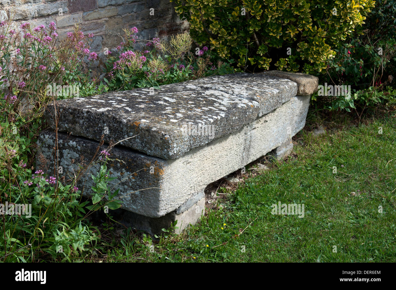 Old coffin in churchyard, St. John the Baptist Church, Crowle, Worcestershire, England, UK Stock Photo