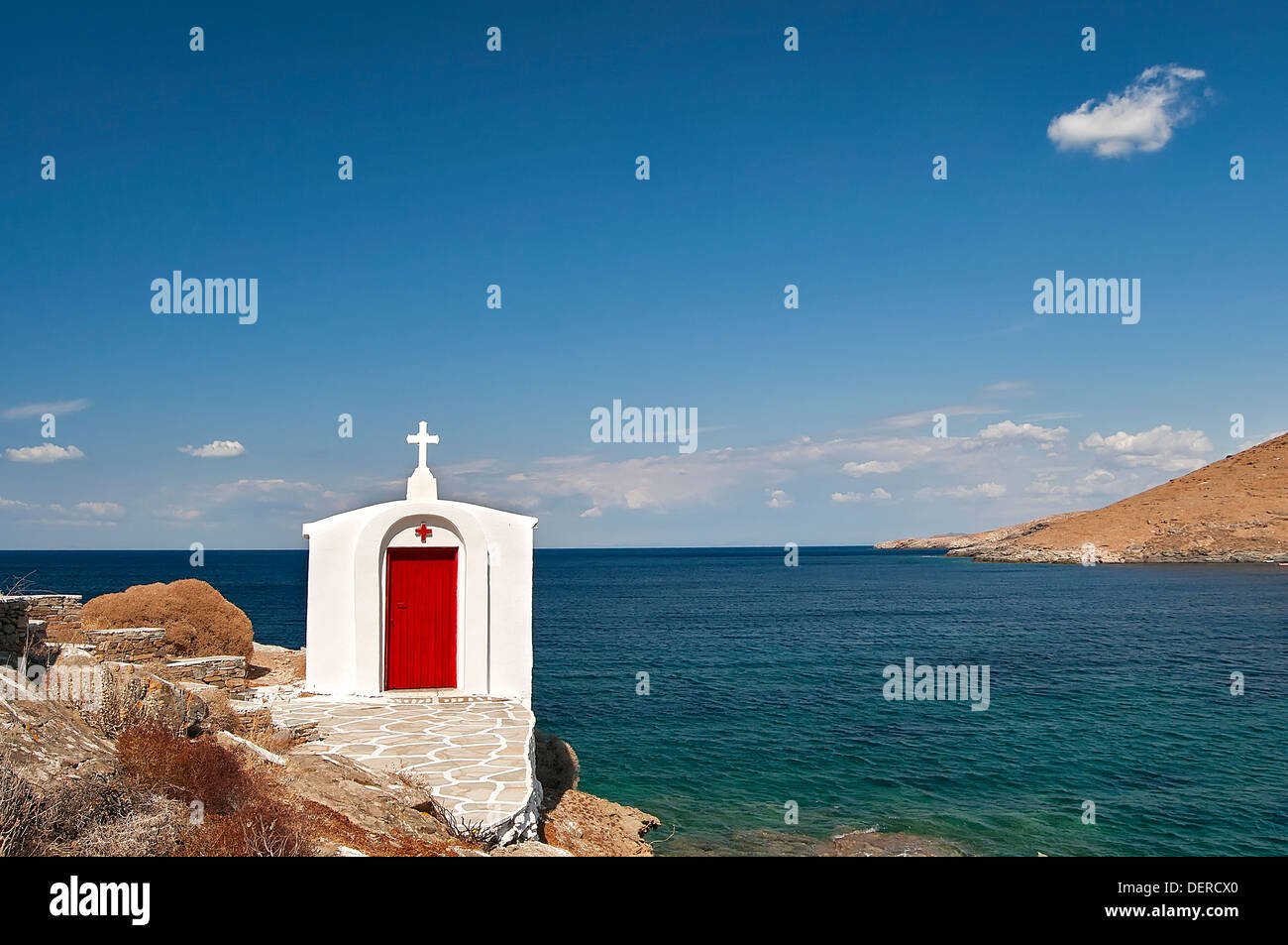 'Kythnos island' Cyclades islands, Greece- chapel next of the Panagia Flampouria church, on the background of the sea Stock Photo