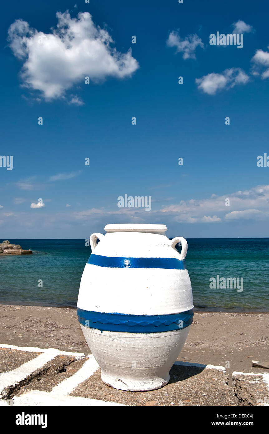 Cyclades, Greece- storage jar painted in the traditional for the Cyclades islands colors- white and blue Stock Photo