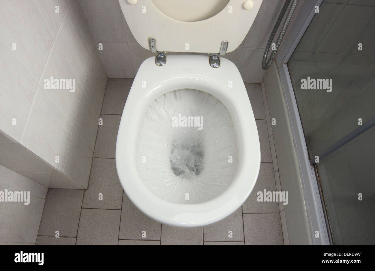 Flush clean wc, water splash in toilet Stock Photo Alamy