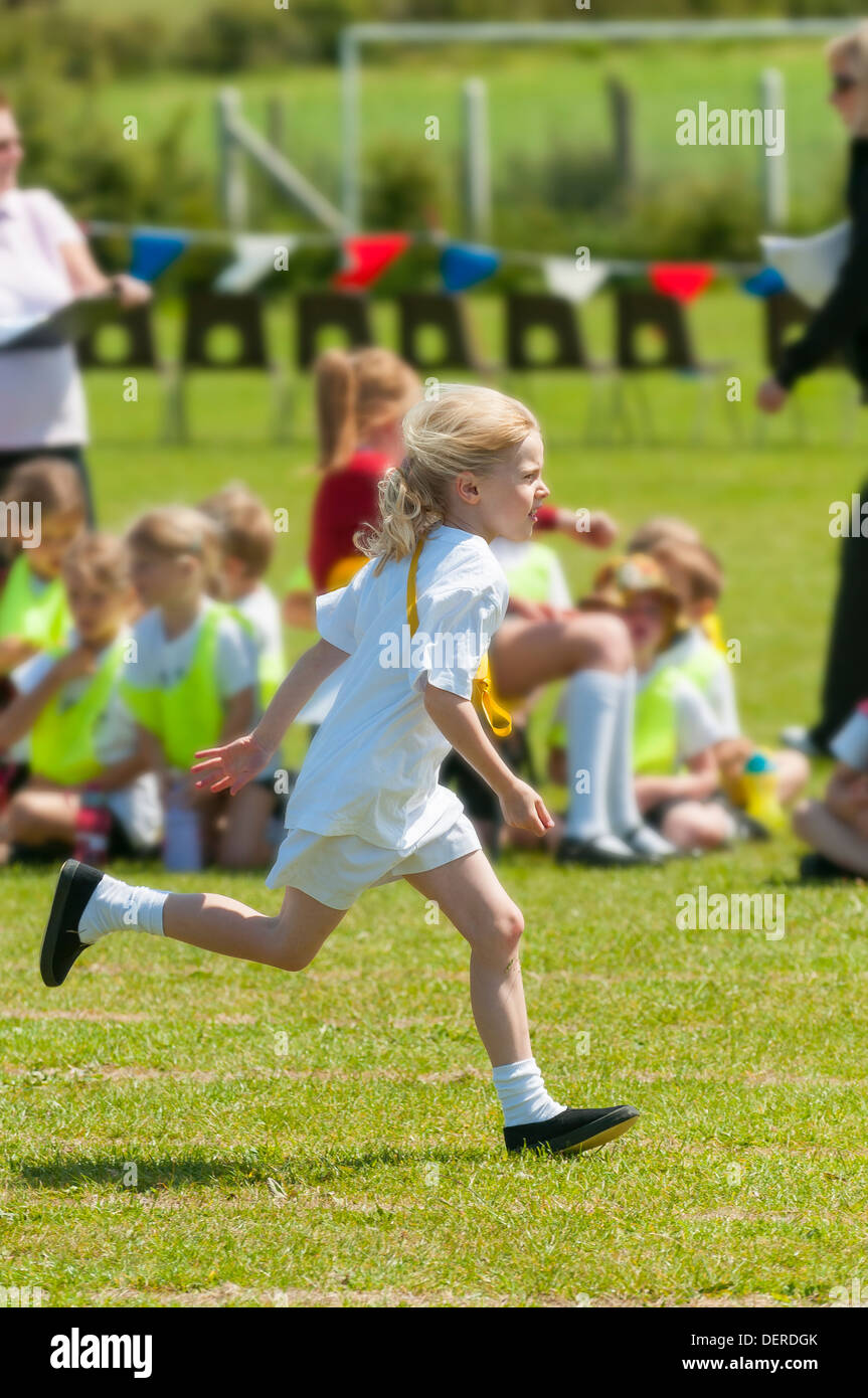young girl running,sports day,poulton,lancashire,england,uk,europe Stock Photo
