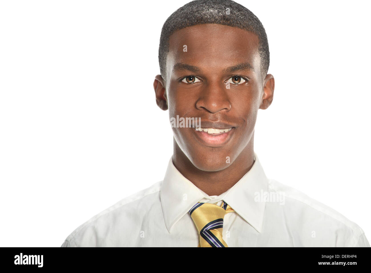 Portrait of young African American businessman smiling isolated over ...