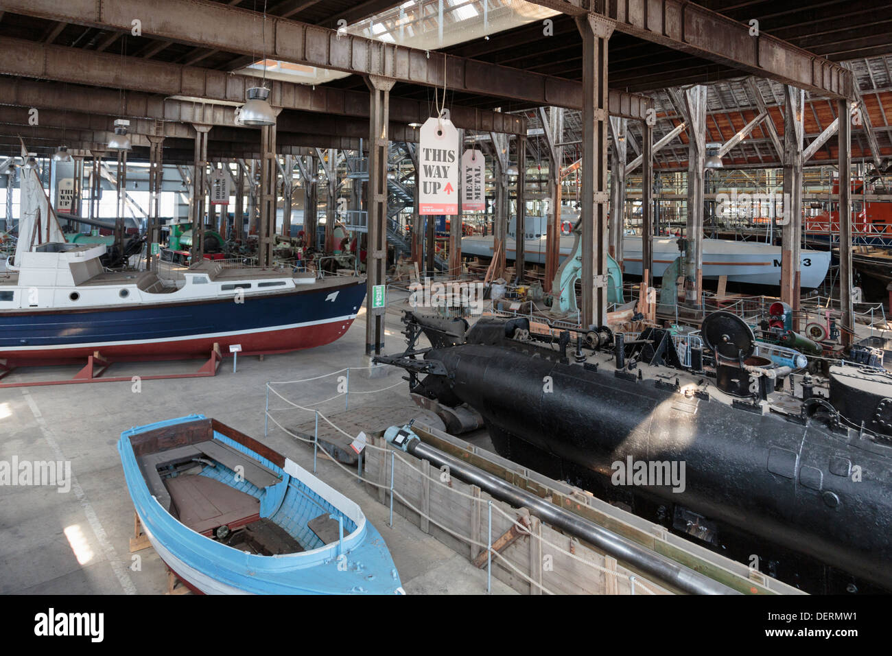 Large objects on display for Royal Engineers museum in The Big Space in Historic Dockyard at Chatham Kent England UK Britain Stock Photo