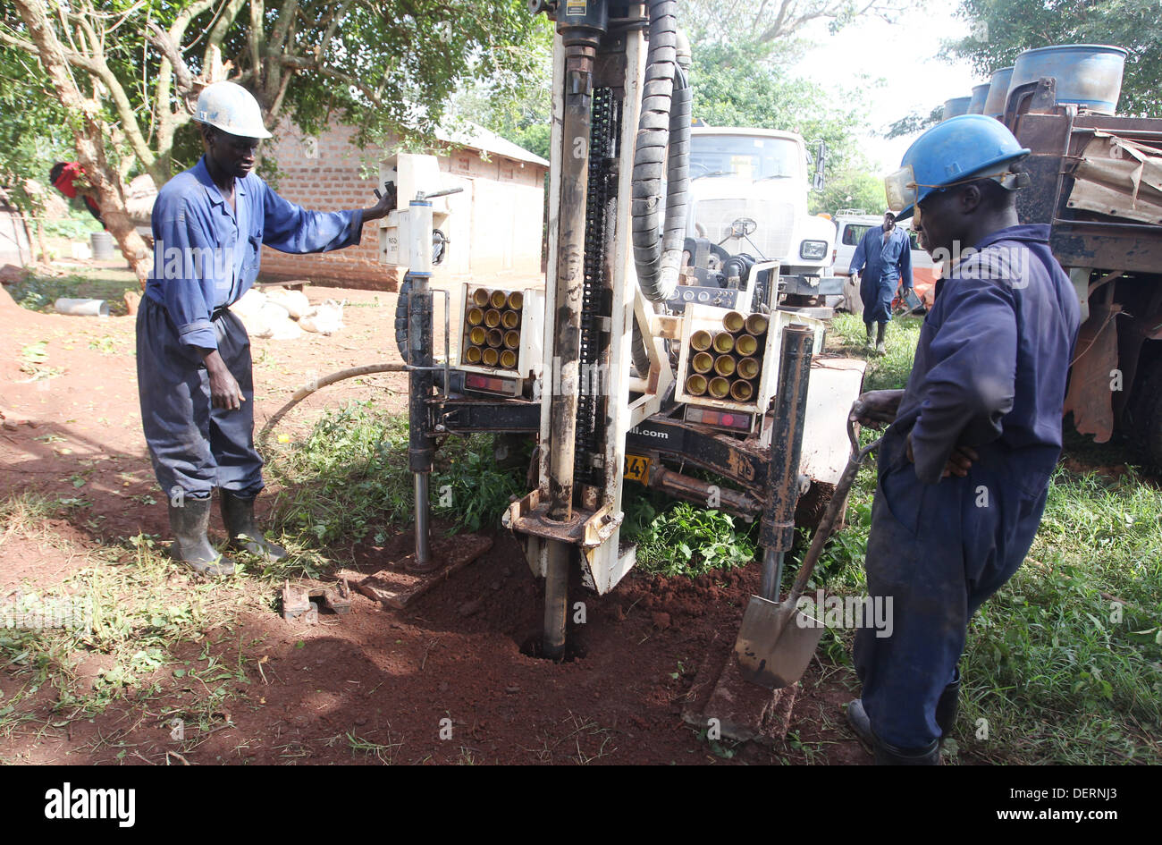 An NGO funded drilling team drill a cleaning drinking water well at a