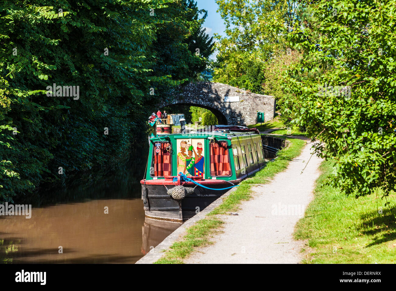 A narrowboat moored along the Monmouthshire and Brecon Canal in the Brecon Beacons National park near Pencelli. Stock Photo