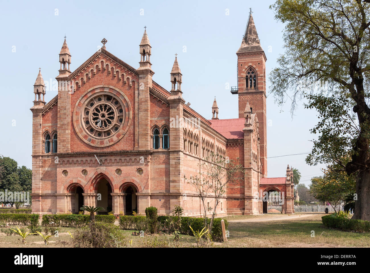 India Kanpur All Souls Church in its park with tower and rosewindow