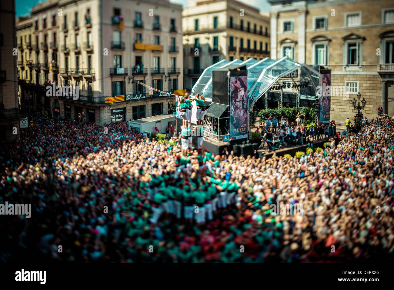 The Castellers of Vilafranca build a human tower 3 of 9 in front of Barcelona's town hall during the city festival, La Merce, 2013 Credit:  matthi/Alamy Live News Stock Photo