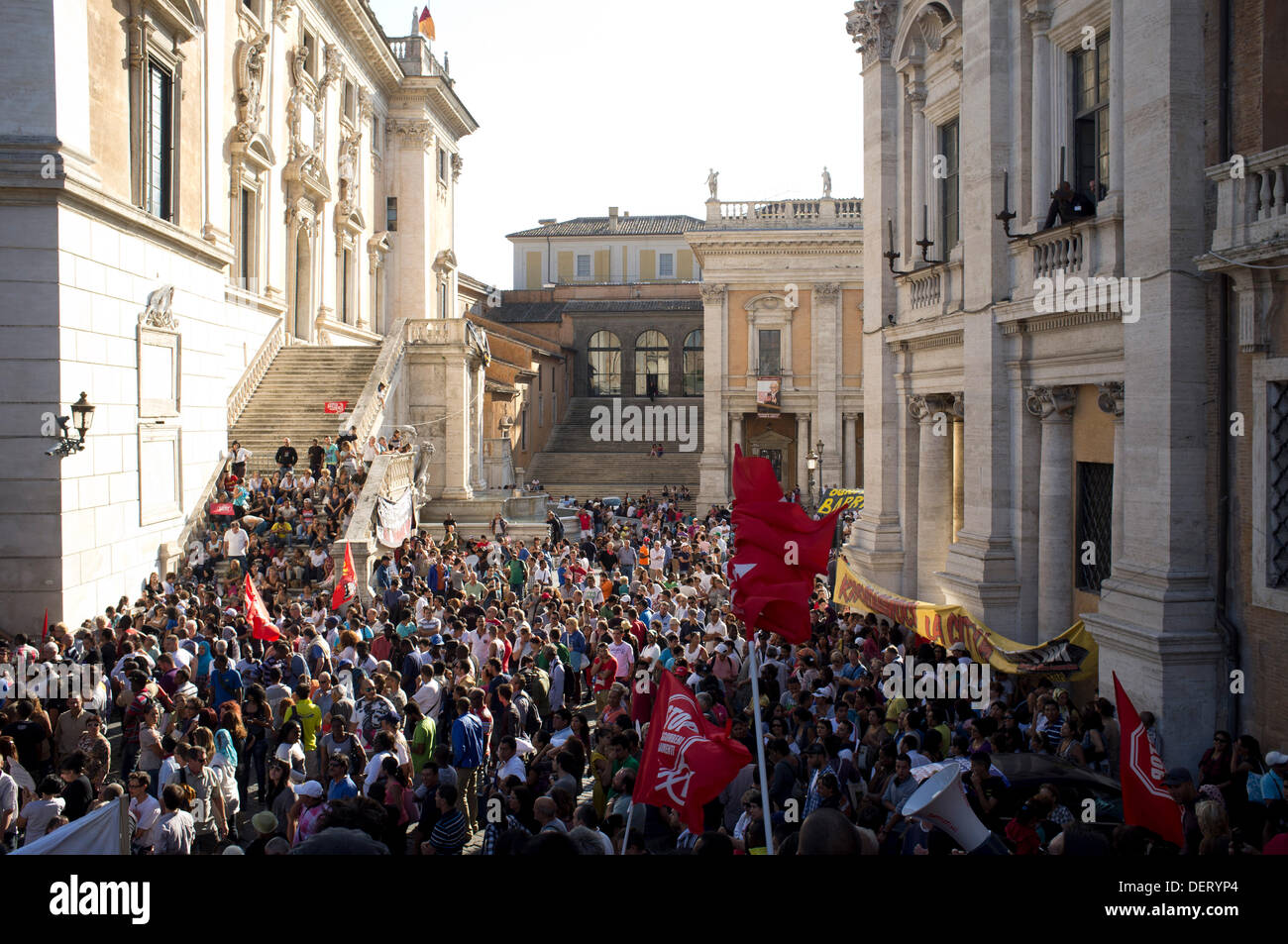 Rome Italy. 23rd Sep, 2013. Hundreds of protesters join tenant unions in central Rome for greater housing rights and stop evictions which have increased during times of economic austerity  affecting families who can ill afford to pay their rents following rent hikes Stock Photo