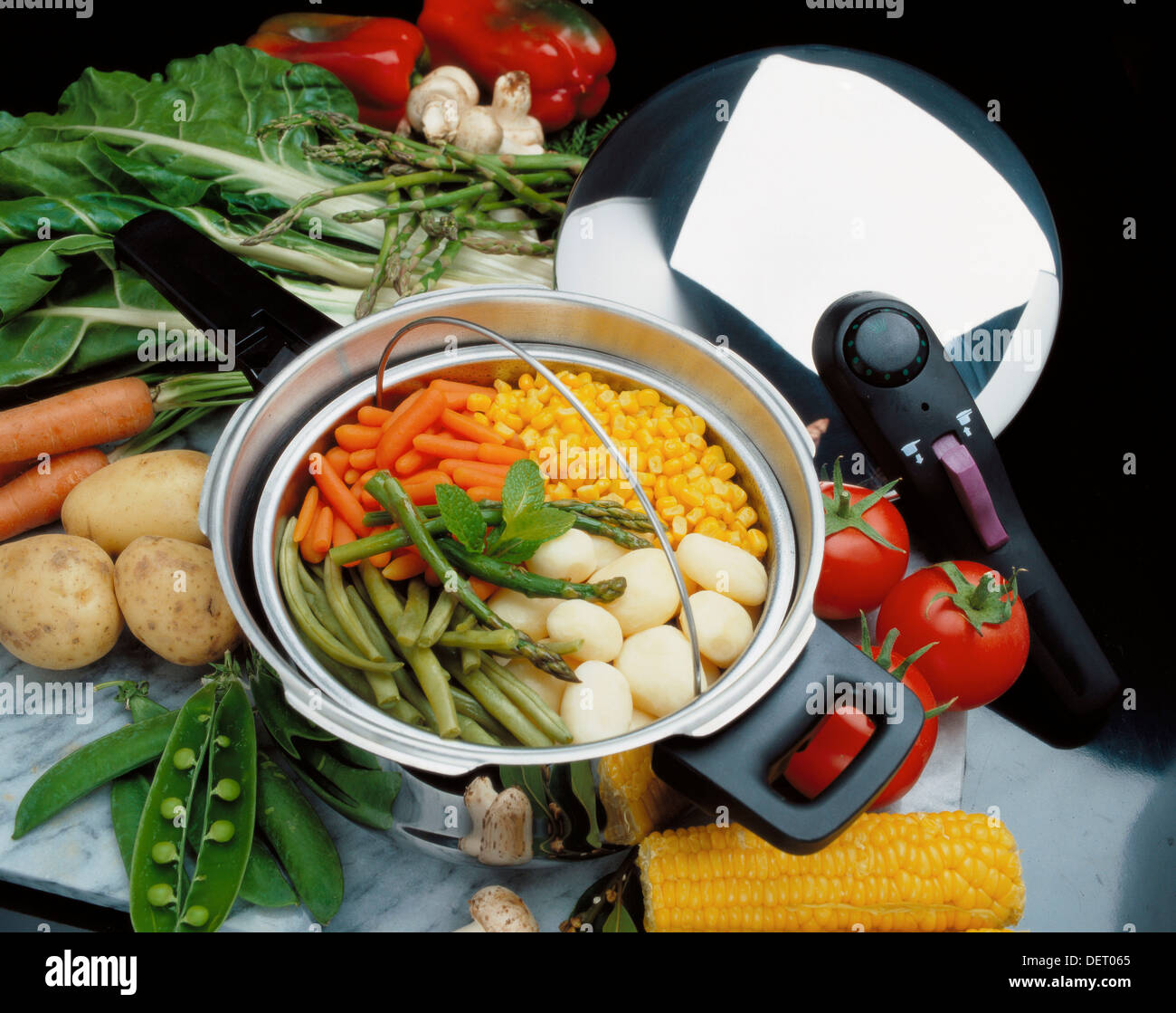 Pressure cooker with vegetables Stock Photo Alamy