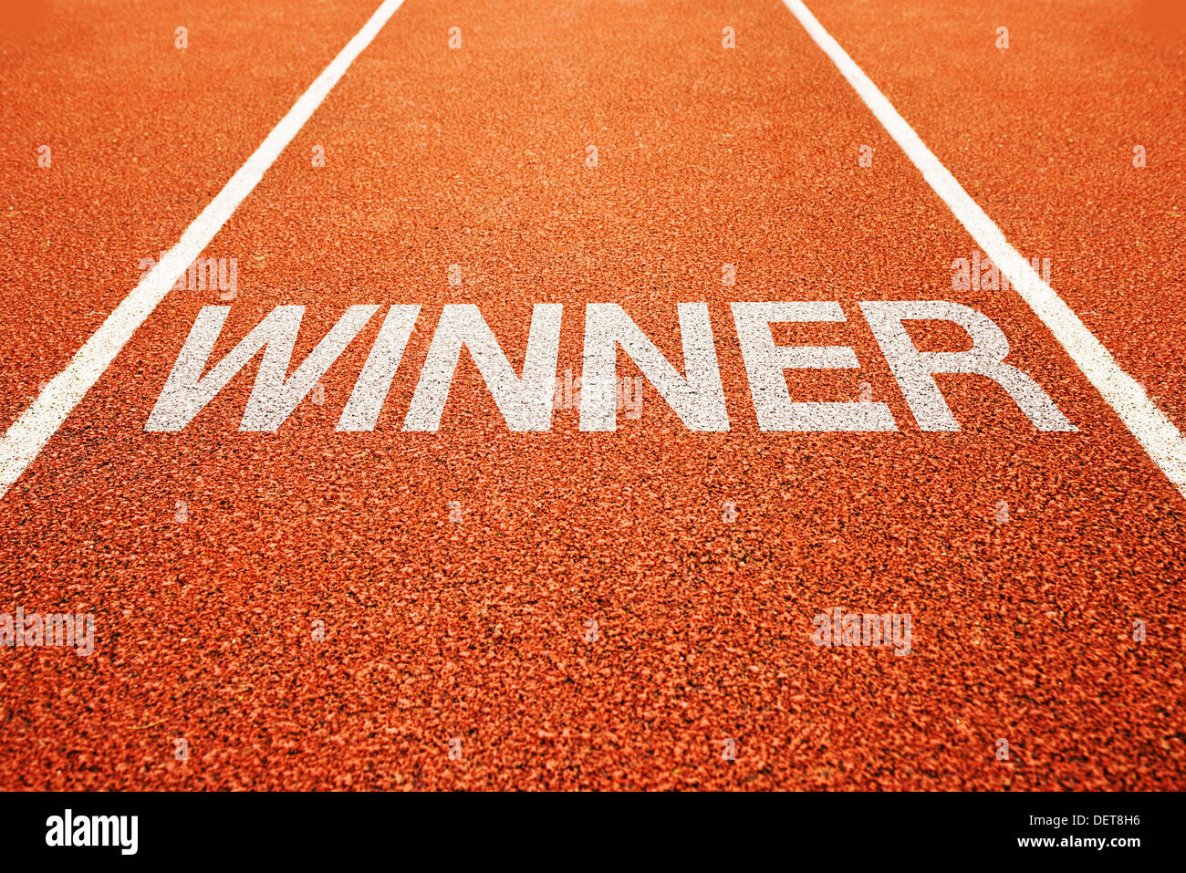 Winner lane. Winner on athletics all weather running track Stock Photo