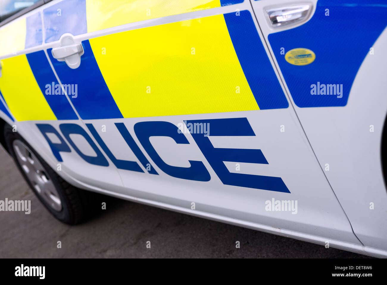The detail on the side of a British Police car Stock Photo