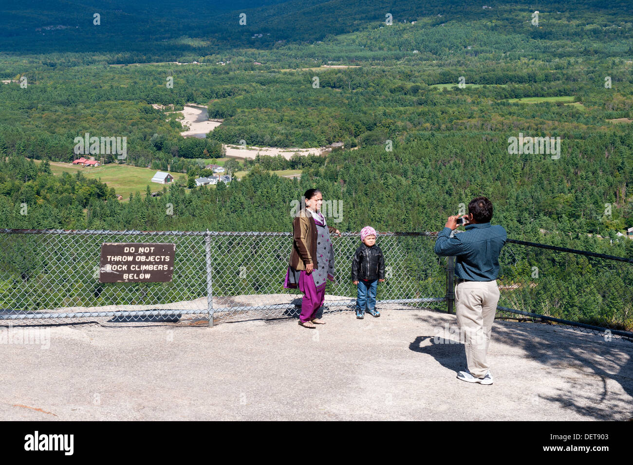 Visitors taking a picture atop Cathedral Ledge, North Conway, USA. Stock Photo