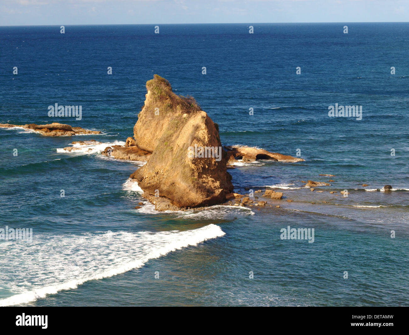 California Devils Rocks Devil's Gate rocks at Calibishie village along the northeast coast of ...