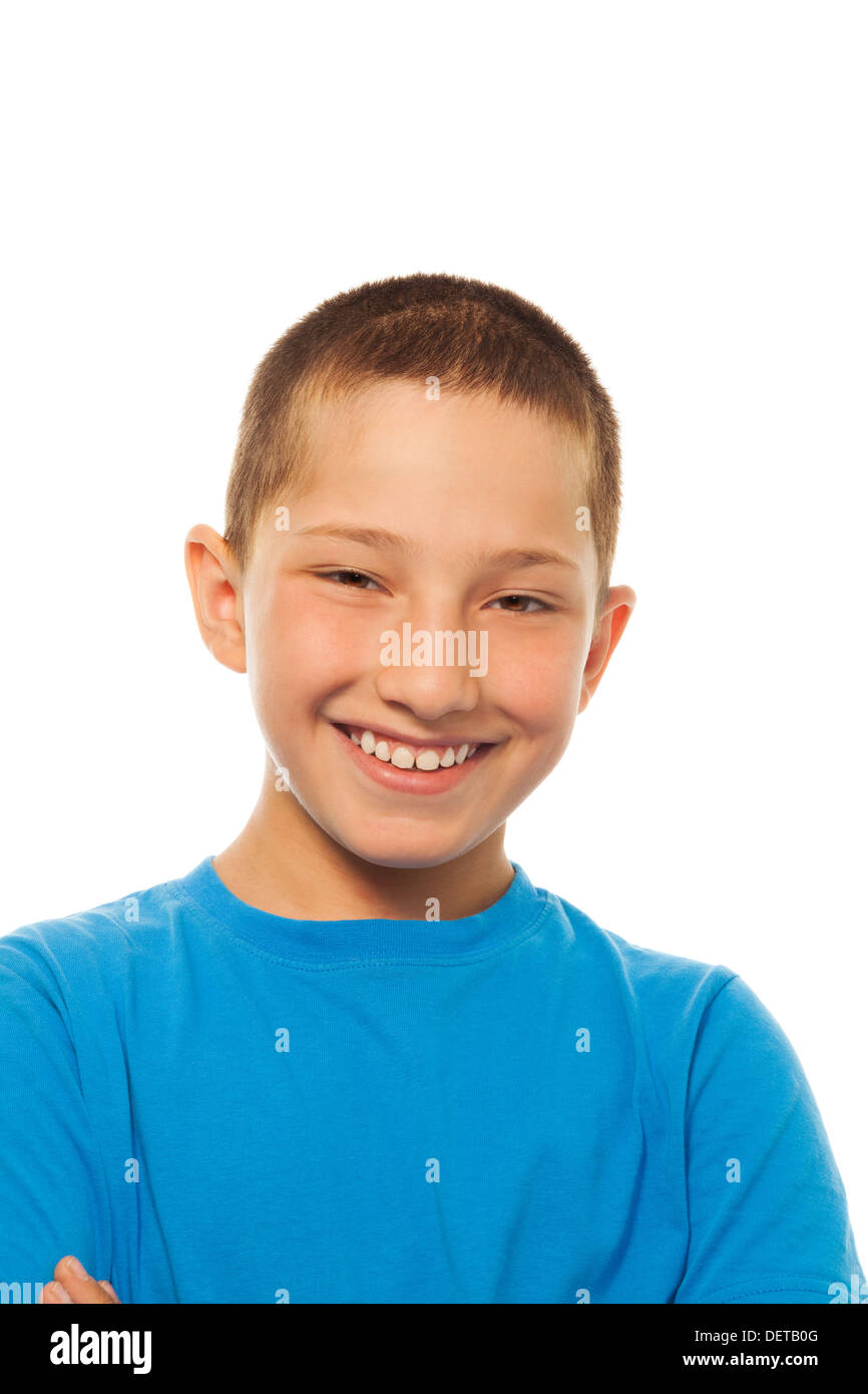 Close portrait of happy young boy smiling, isolated on white Stock Photo