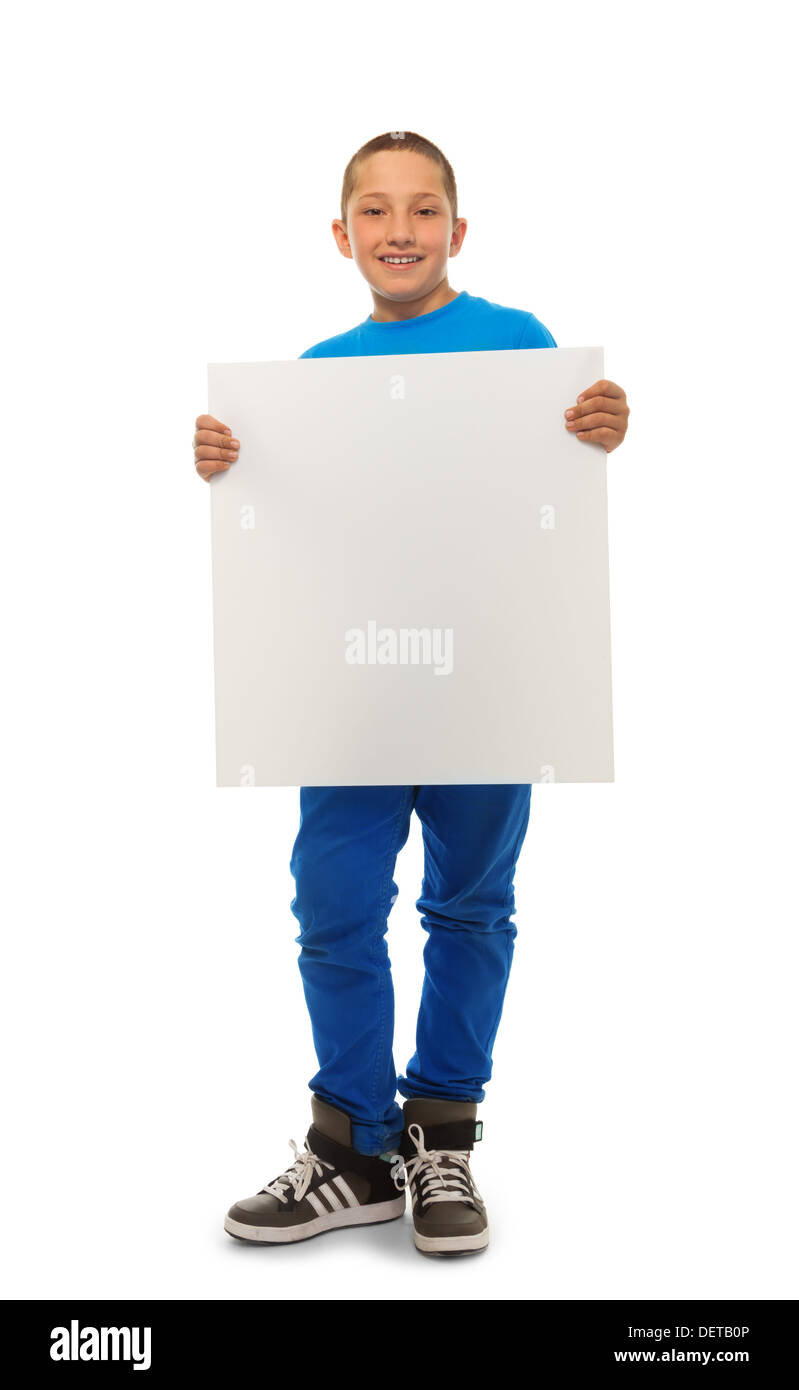 Portrait of happy young boy holding blank sign banner isolated on white Stock Photo