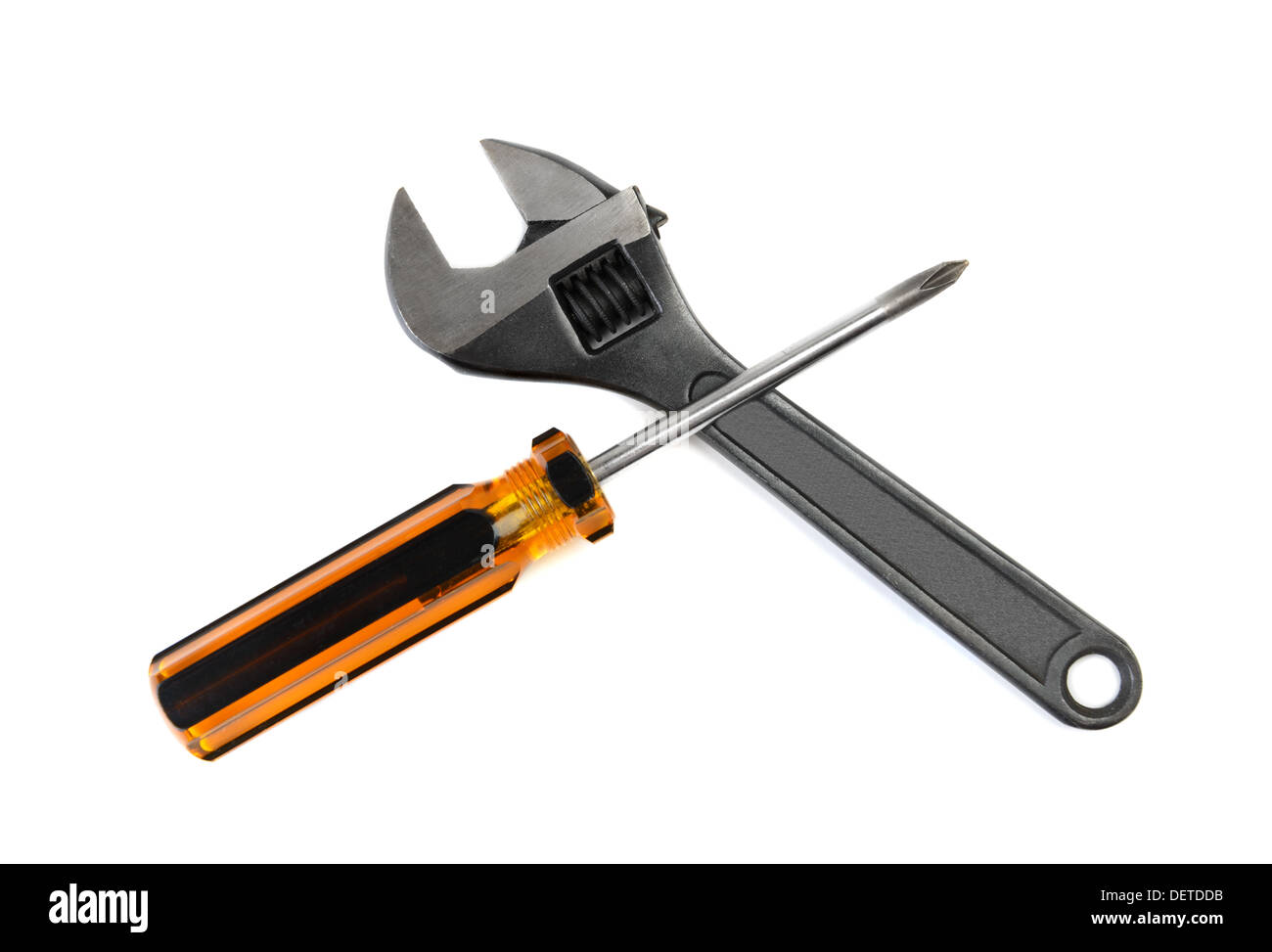 adjustable wrench and screwdriver on white Stock Photo
