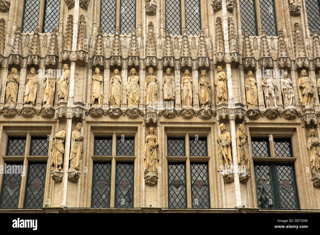 Figures carved on the facade of the Hotel de Ville in Brussels Belgium Stock Photo