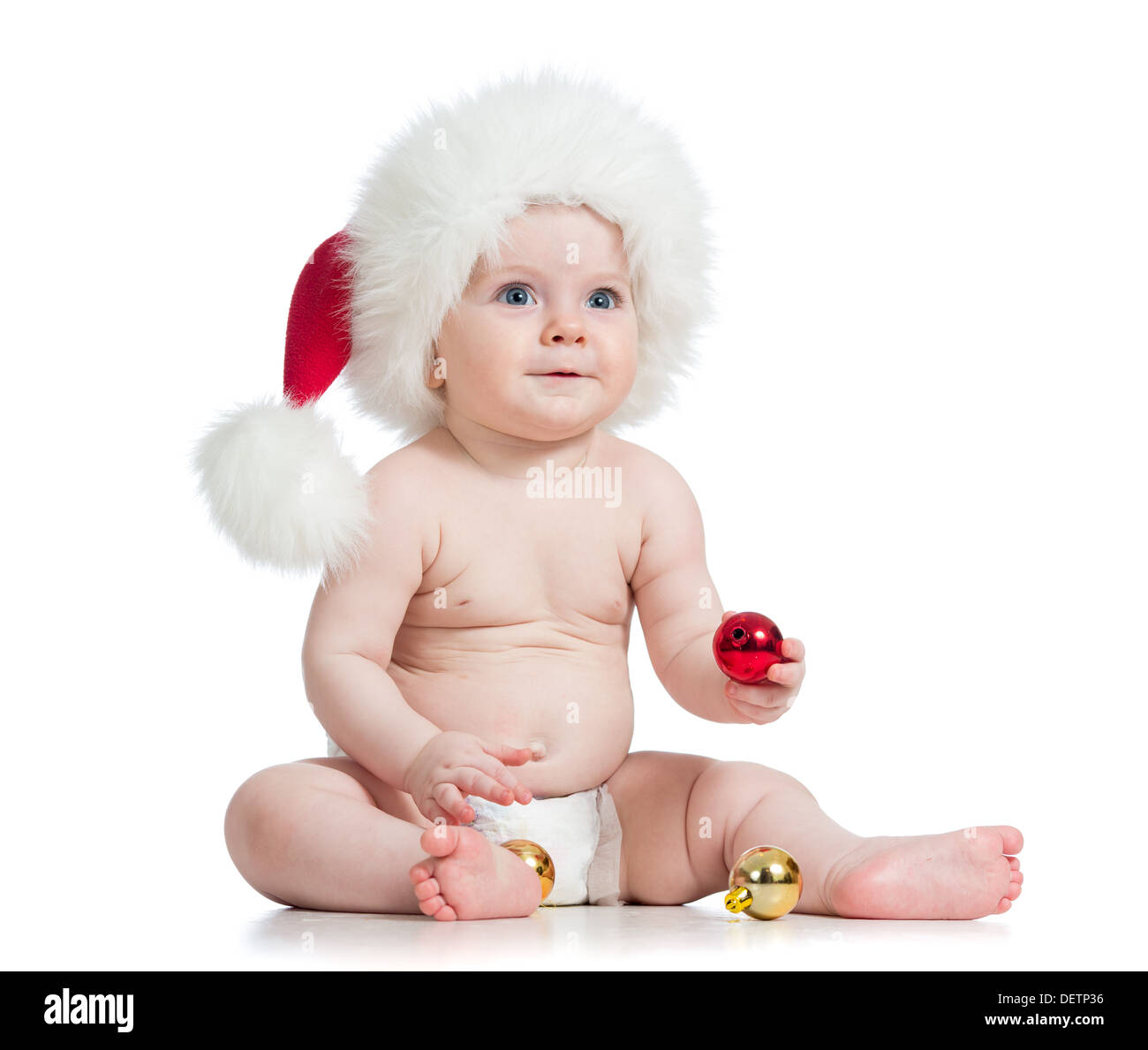 baby girl with Santa Claus hat Stock Photo