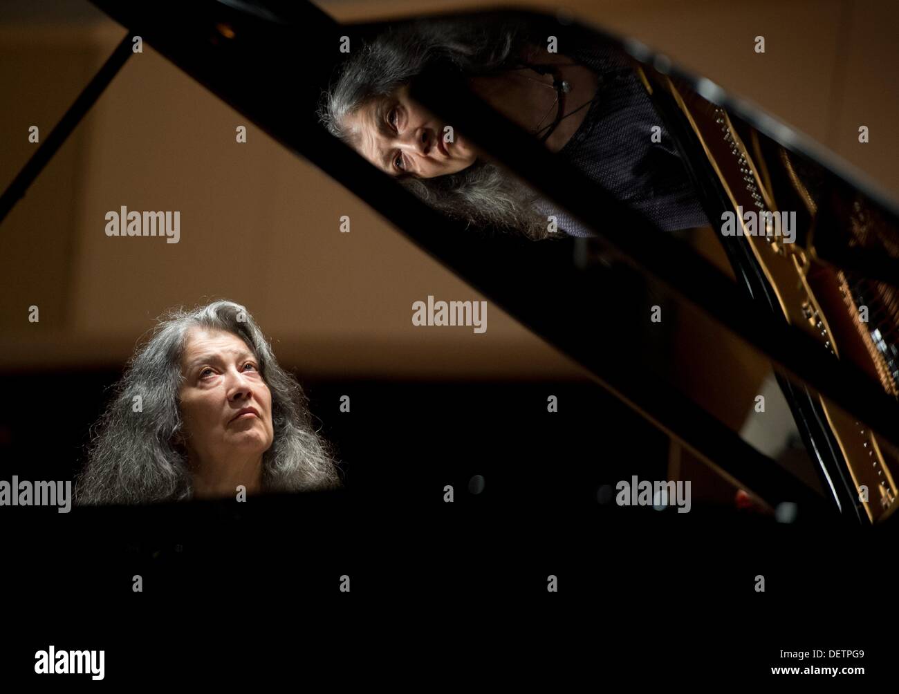 Argentine pianist Martha Argerich  sits at a grand piano during a rehersal at the Philharmonic concert venue Berlin, Germany, 14 September 2013. Photo: Soeren Stache Stock Photo