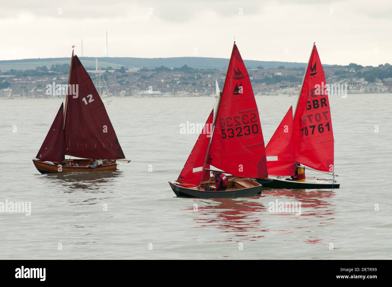 sailing dinghies racing in light winds Stock Photo Alamy