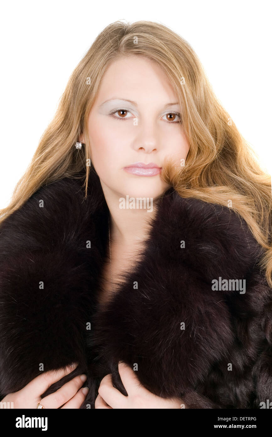 Portrait of the beautiful young lady in a fur coat Stock Photo - Alamy