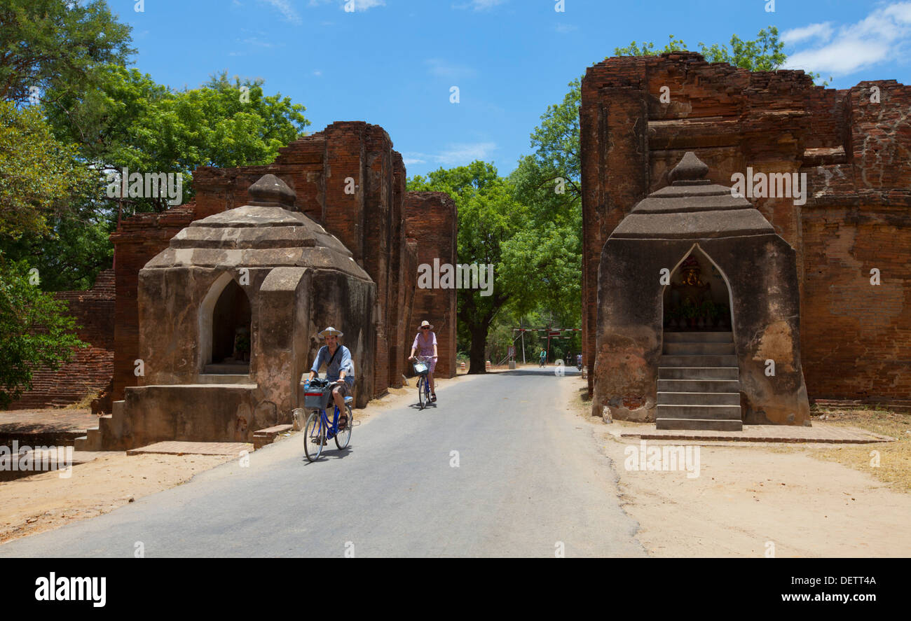 Tourist bicycle through Tharaba Gate in Bagan. Stock Photo