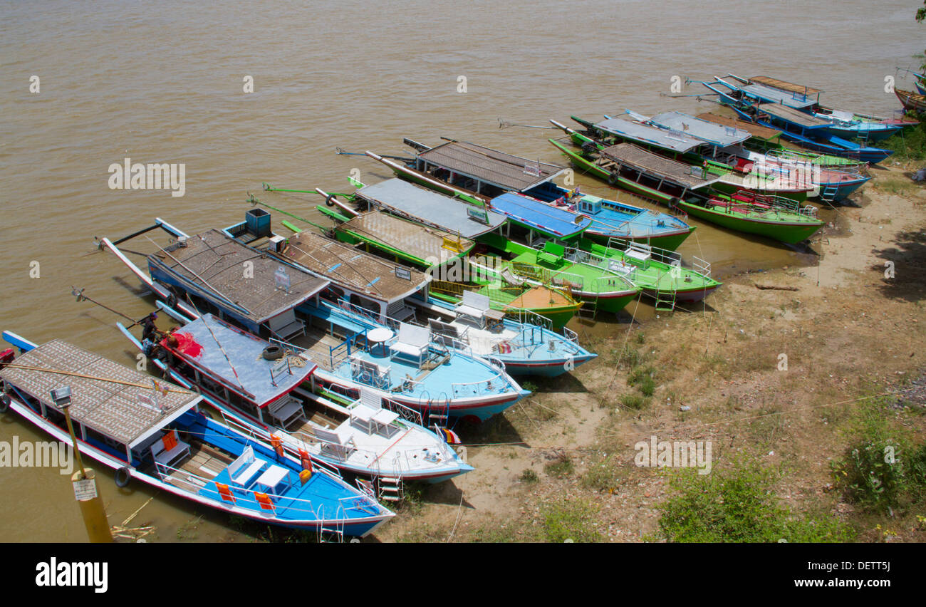 Boats docked on the Ayerarwady River in Old Bagan. Stock Photo