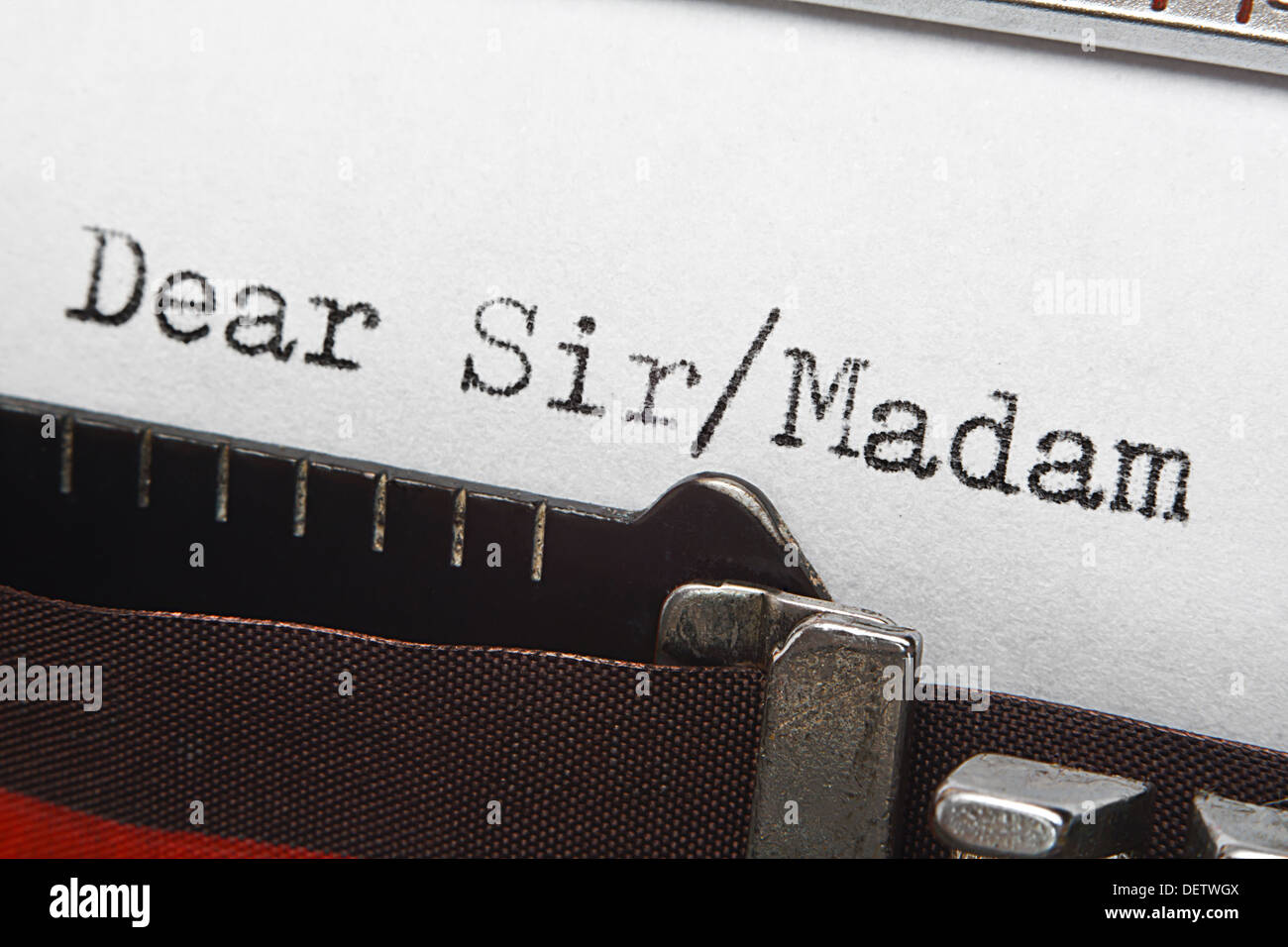 Old retro typewriter letter introduction or greeting, dear sir/madam. Great concept for formal letter writing. Stock Photo