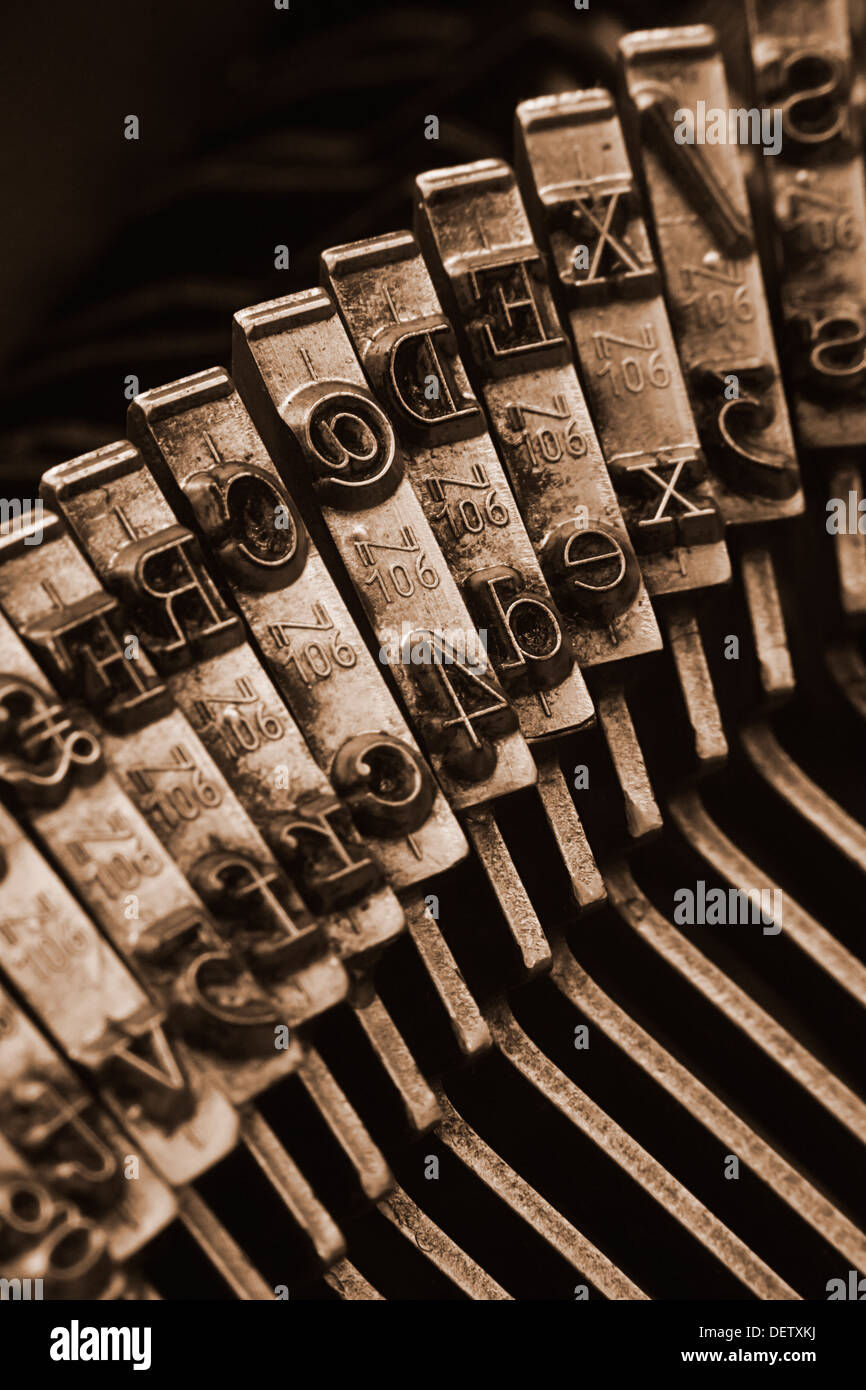 Close up of antique typewriter typebars with focus on the @ symbol, great concept for blogs, journalism, news or the mass media Stock Photo