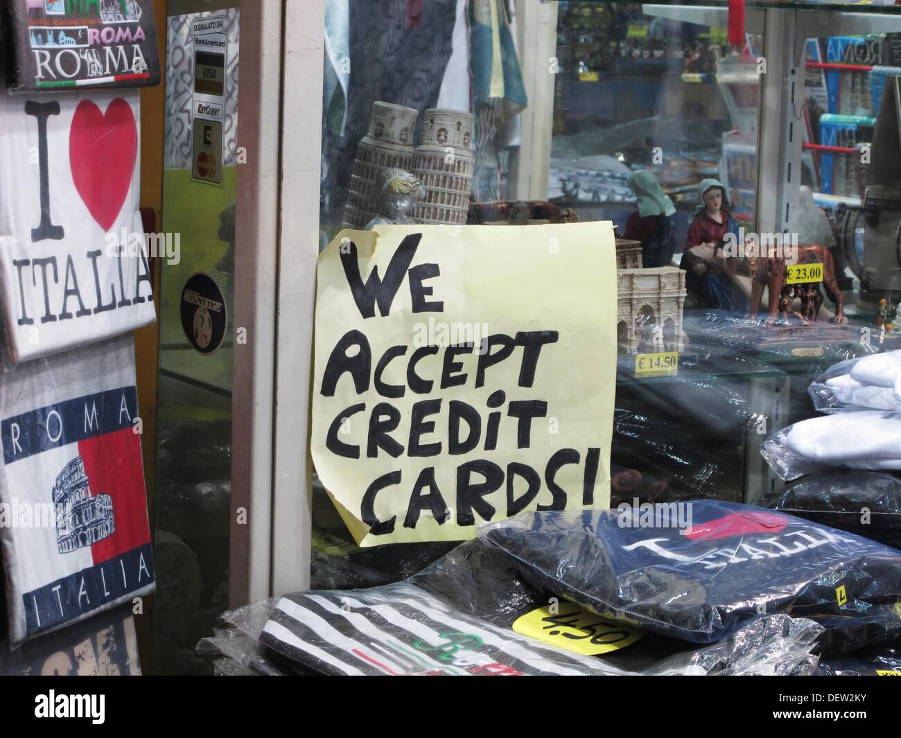 We accept credit cards sign in shop window in Rome, Italy Stock Photo