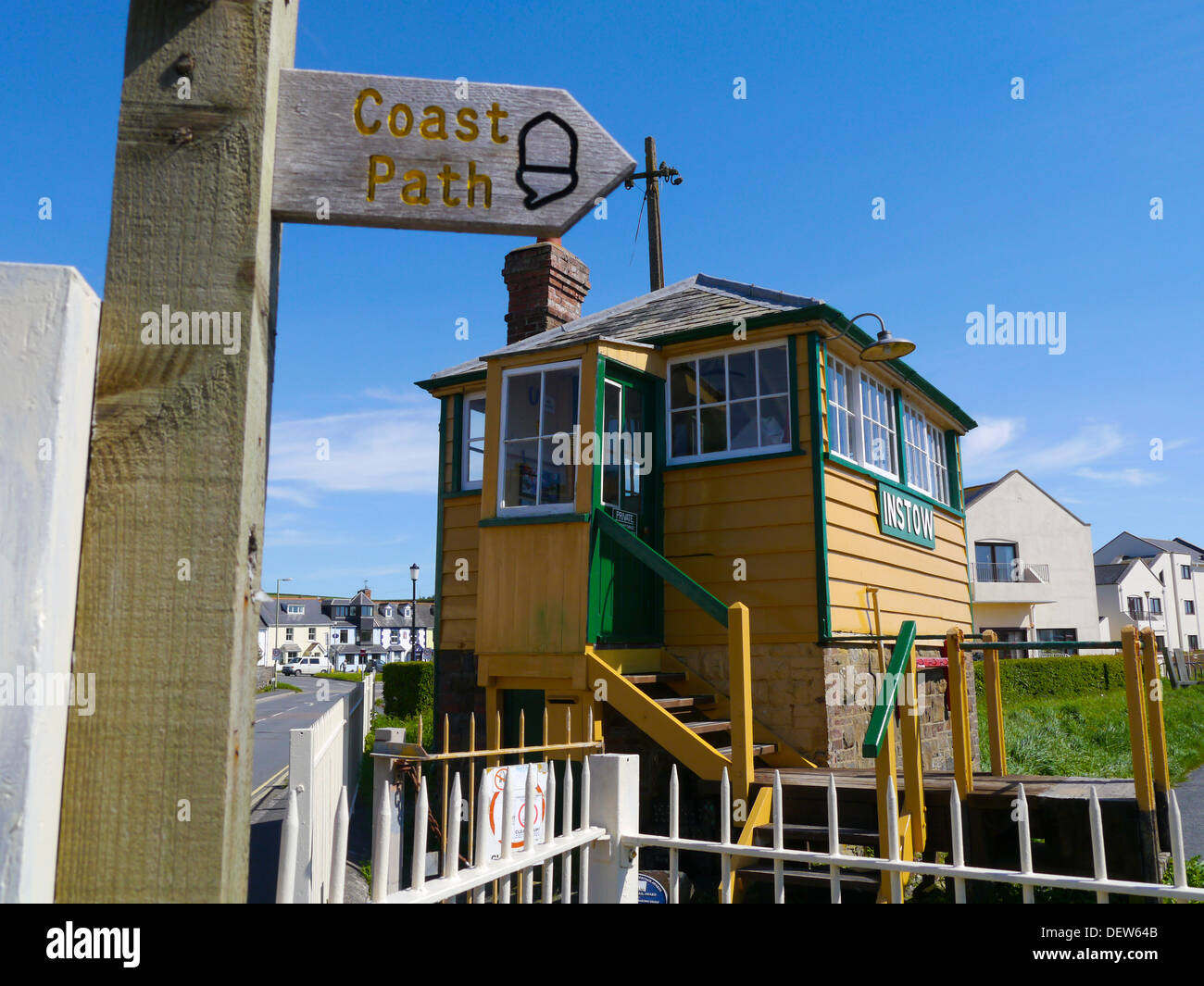 Coast path sign and railway signal box on the Tarka Trail at Instow, Devon, England, UK Stock Photo
