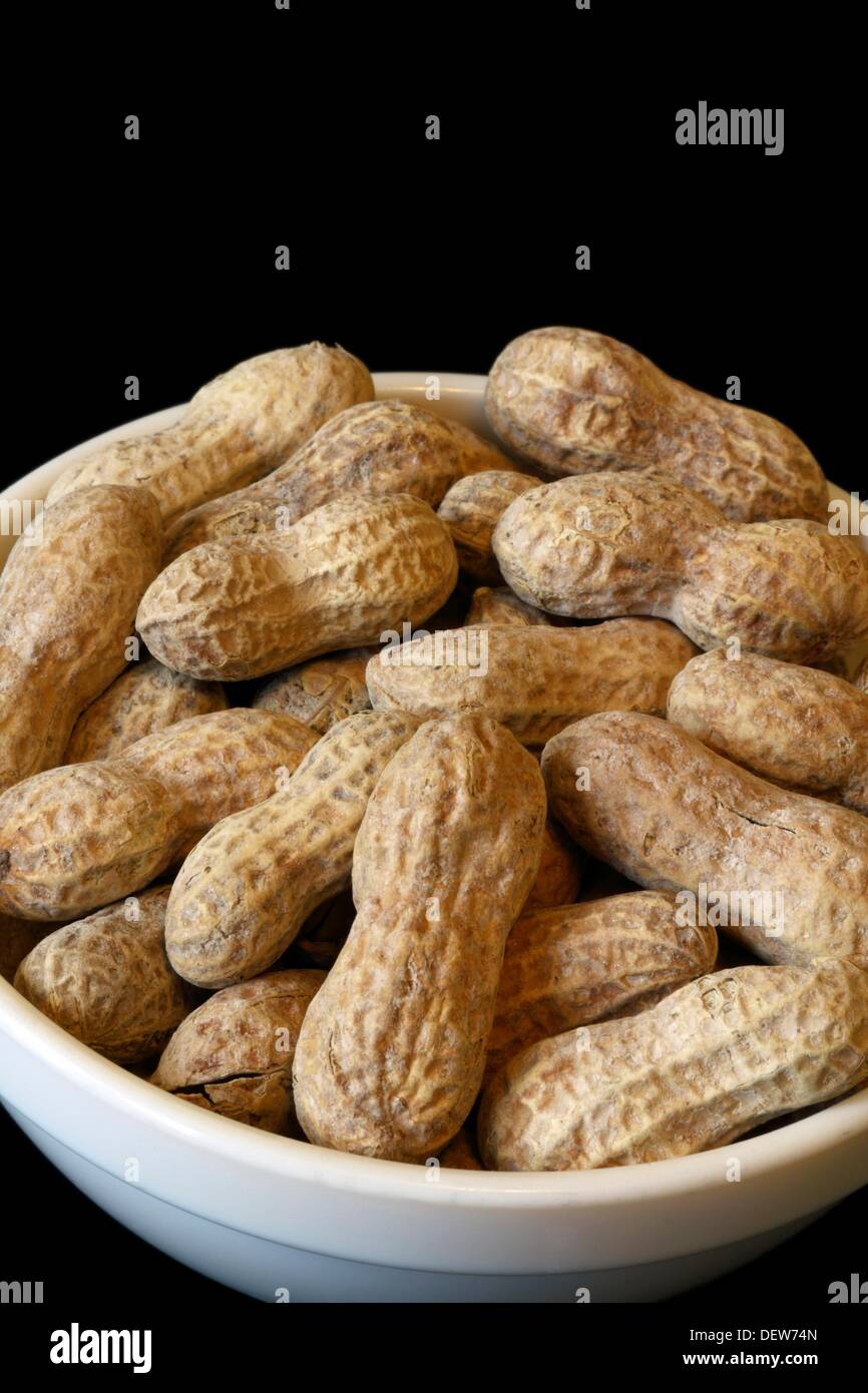 A bowl of salted peanuts in the shell Stock Photo Alamy