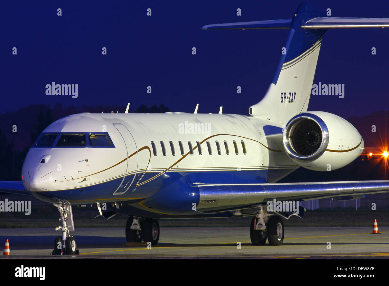 Business jet Bombardier aircraft night photo Stock Photo