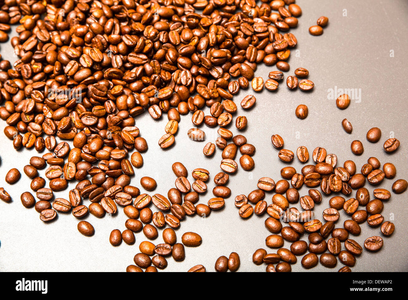 Roasted Coffee beans on a dark background Stock Photo - Alamy