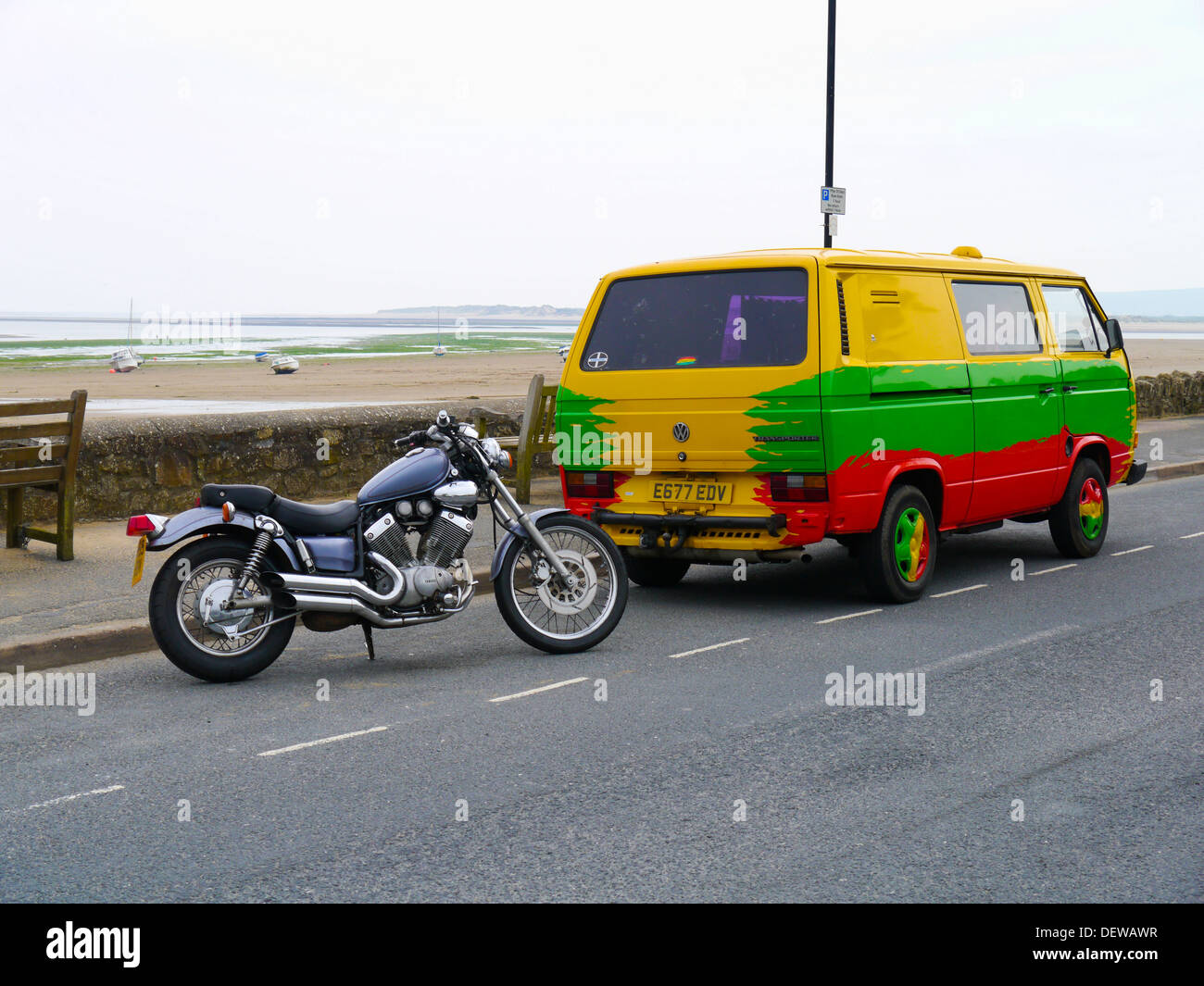 Camper van and motorbike on seafront at Instow Devon England UK Stock