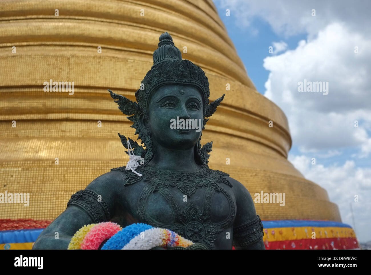 Statue of Indra in front of the gold chedi at Wat Saket (Golden Mount), Bangkok Stock Photo